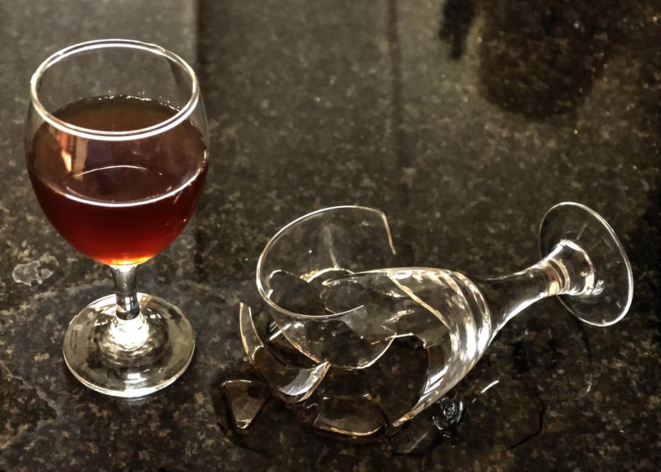 broken glass near of wine
