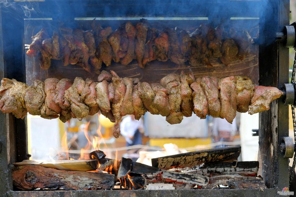 hot roast meat with spices on the fire