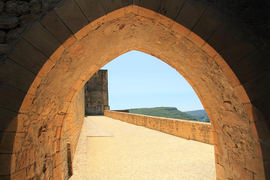 Beautiful archway of the architecture, in light, on the mountains
