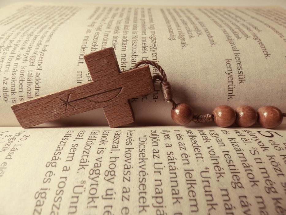 Cross on Bible Book page
