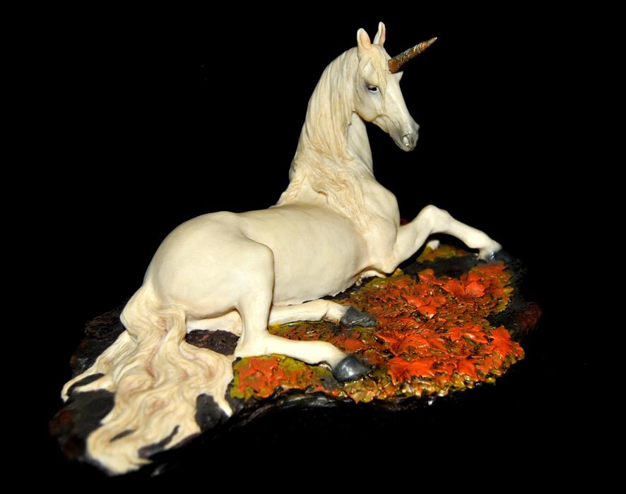 beautiful statue of a white unicorn