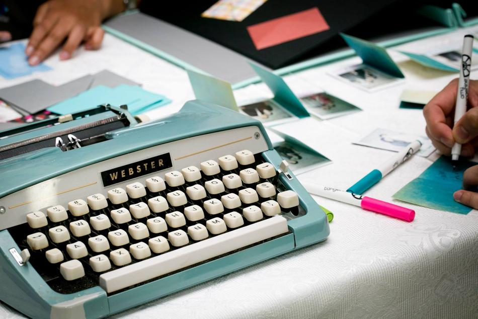 typewriter with papers