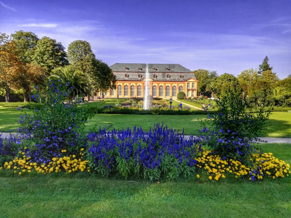 Beautiful building, among the colorful plants in Bessungen, Darmstadt, Hesse, Germany