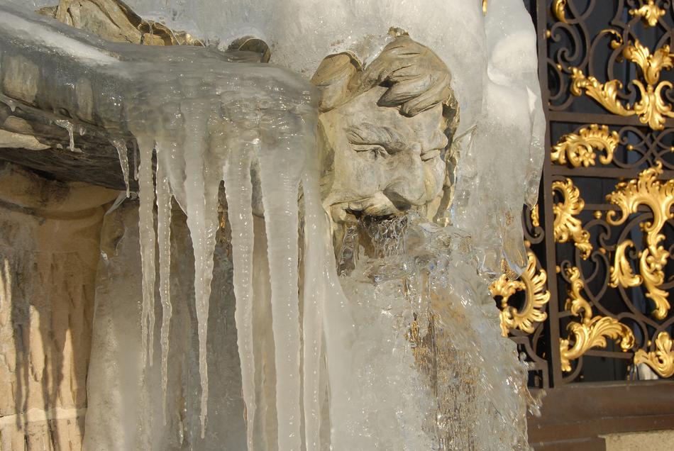 white ice on the stone lion