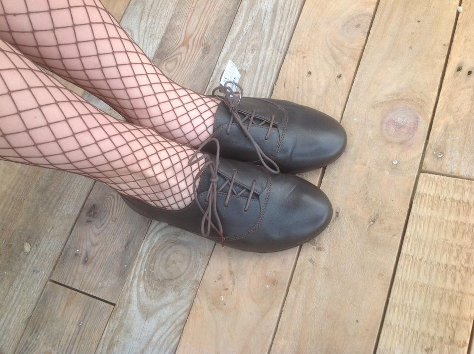 a girls feet in shoes