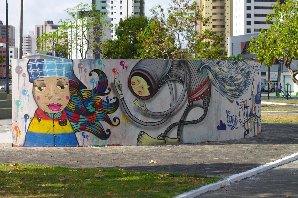 Colorful and beautiful graffiti on the wall, among the buildings