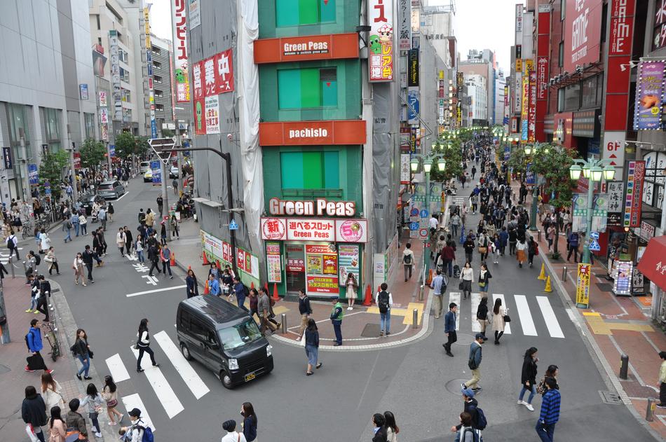 people walking on the streets of japan