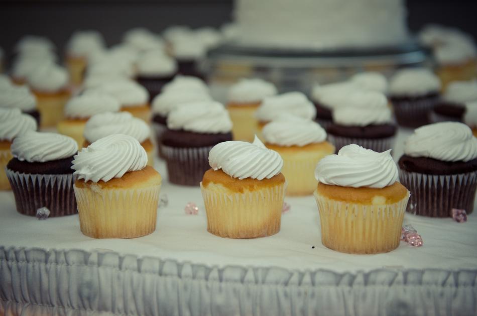 Delicious cupcakes with cream decoration