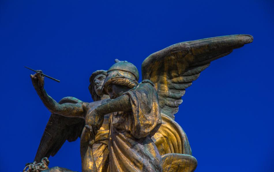 bronze angels on a blue background