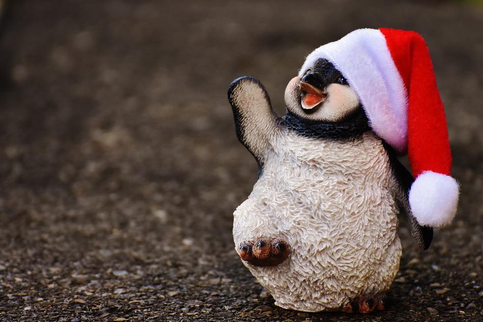 ceramic penguin with christmas cap