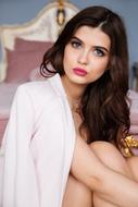 photo of a beautiful girl in a white jacket