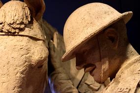 sculpture of a soldier in a helmet close up