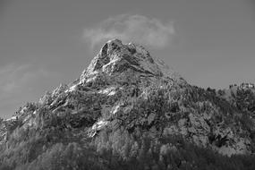 cloud on top of a mountain