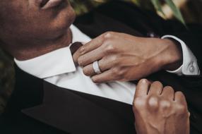 dark skin man in tie suit, detail