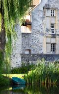 boat on the shore of the pond at Saint-Pierre Castle