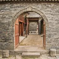 arched door in the fence