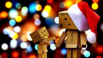 cardboard cute figures in a red hat