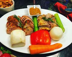Meat with vegetables and sauce