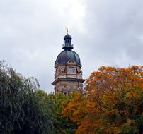 autumn park against the background of the historic tower in Hamburg