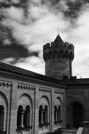 an unusual castle in the clouds black and white