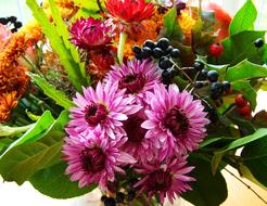 colored bouquet of flowers in a vase