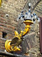 yellow pipe on the wall