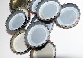 Iron bottle caps on the table