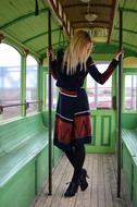 photo of a girl in a vintage tram