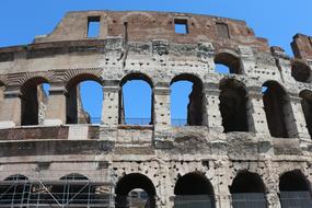 facade of the destroyed Colosseum in Rome