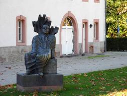 Johannes Kirschweng, german priest sculpture at Abbey Building