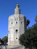 Stone tower against the blue sky in Spain