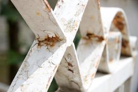Beautiful, white, rusty steel grating lattice