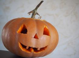 a holiday pumpkin with a face