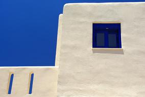 white facades of buildings on the sea coast