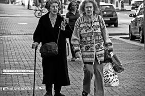 monochrome picture of the couple of old women