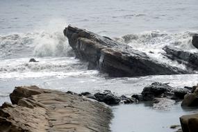 stones with waves of white