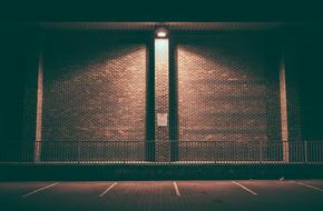 lantern on Brick Wall at night