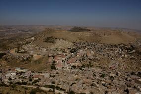 aerial view of village on hills, turkey, mardin