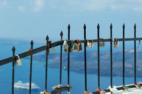 iron locks on the fence on a blue background