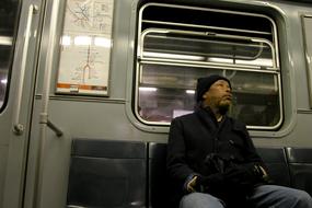 lonely man on the subway in Milan