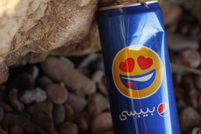 Arabic Pepsi with a smiley face