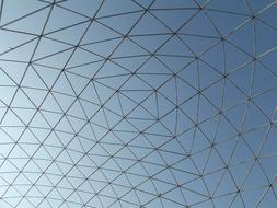 metal cage in the park against the sky