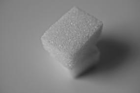 closeup picture of the sugar cubes on the white background