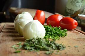 Onions and tomatoes on the table