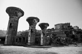 Black and White photo of Towers in City