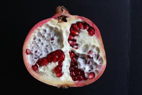 half a ripe pomegranate