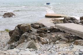stone beach with the sea is beautiful