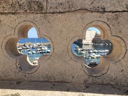 two windows in the sea wall