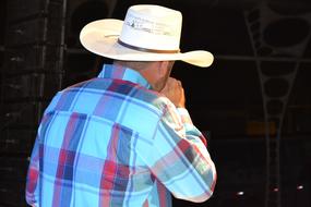 singer in cowboy hat