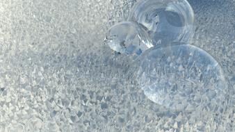 photo of soap bubbles on ice